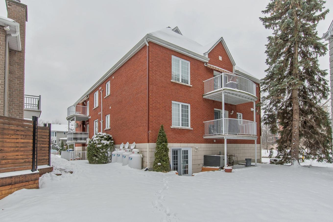 Back facade - 4727 Crois. Des Îles, Laval (Chomedey), QC - Outdoor With Exterior