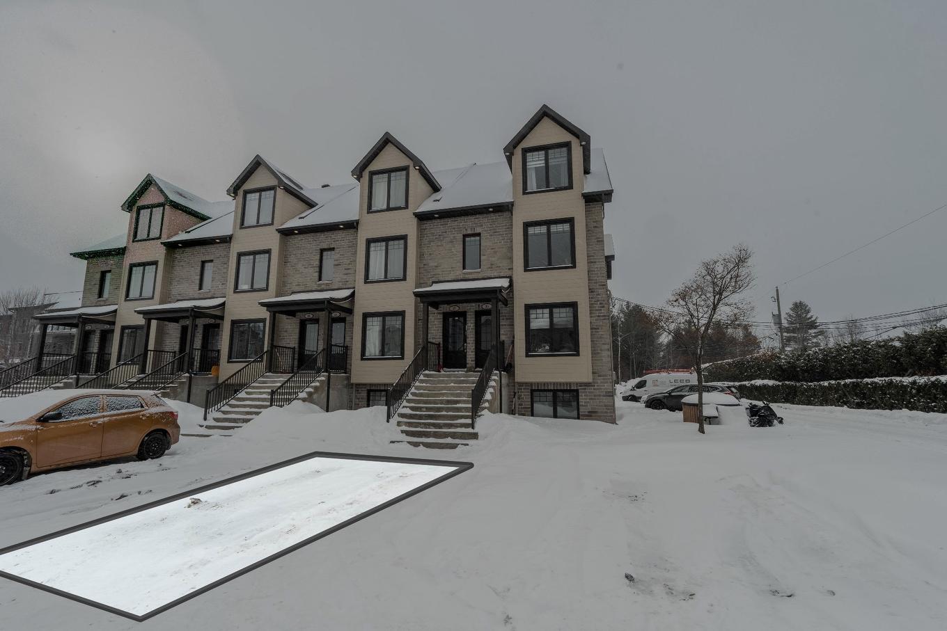 Parking - 208-18495 Rue J.-A.-Bombardier, Mirabel, QC - Outdoor With Facade