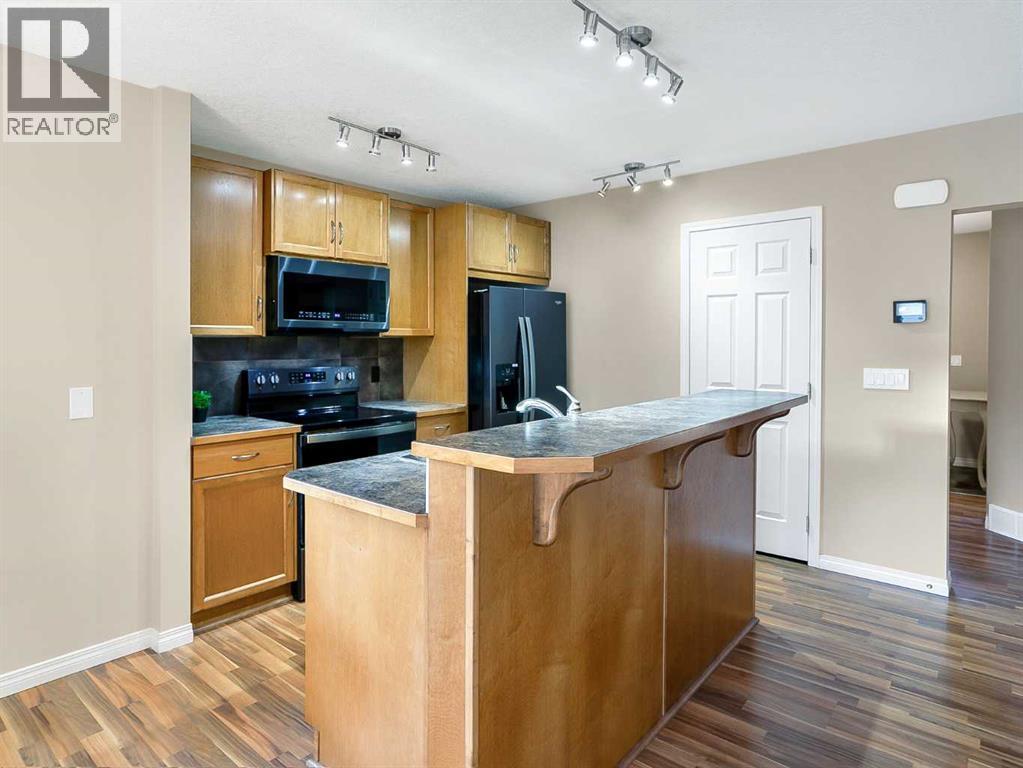37 Silverado Saddle Avenue Sw, Calgary, AB - Indoor Photo Showing Kitchen