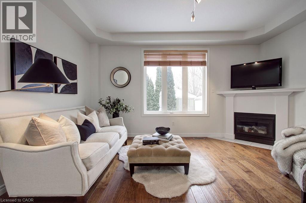 2446 Sutton Drive, Burlington, ON - Indoor Photo Showing Living Room With Fireplace