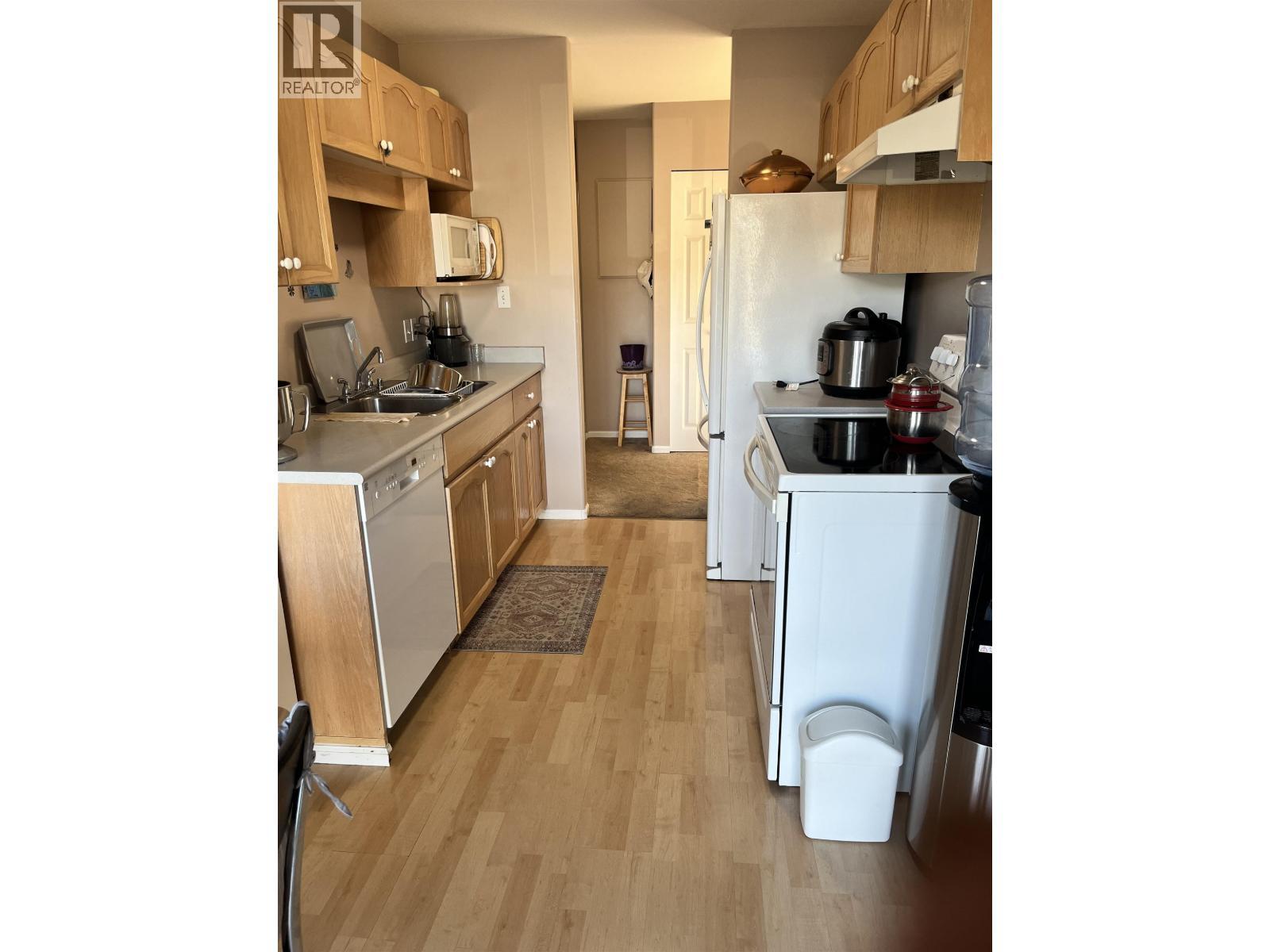 4 4737 Walsh Avenue, Terrace, BC - Indoor Photo Showing Kitchen With Double Sink