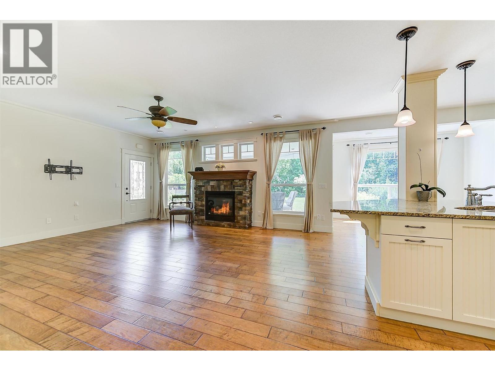 2423 Paramount Drive, West Kelowna, BC - Indoor Photo Showing Living Room With Fireplace