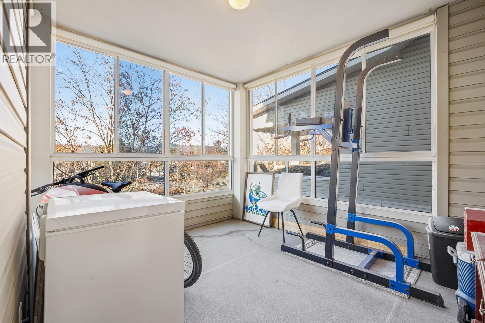 Spacious Covered Patio - 555 Houghton Road Unit# 206, Kelowna, BC - Indoor