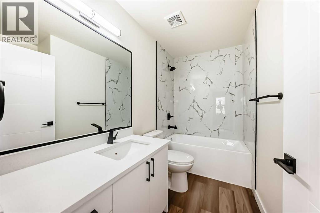 936 Cranston Drive Se, Calgary, AB - Indoor Photo Showing Bathroom