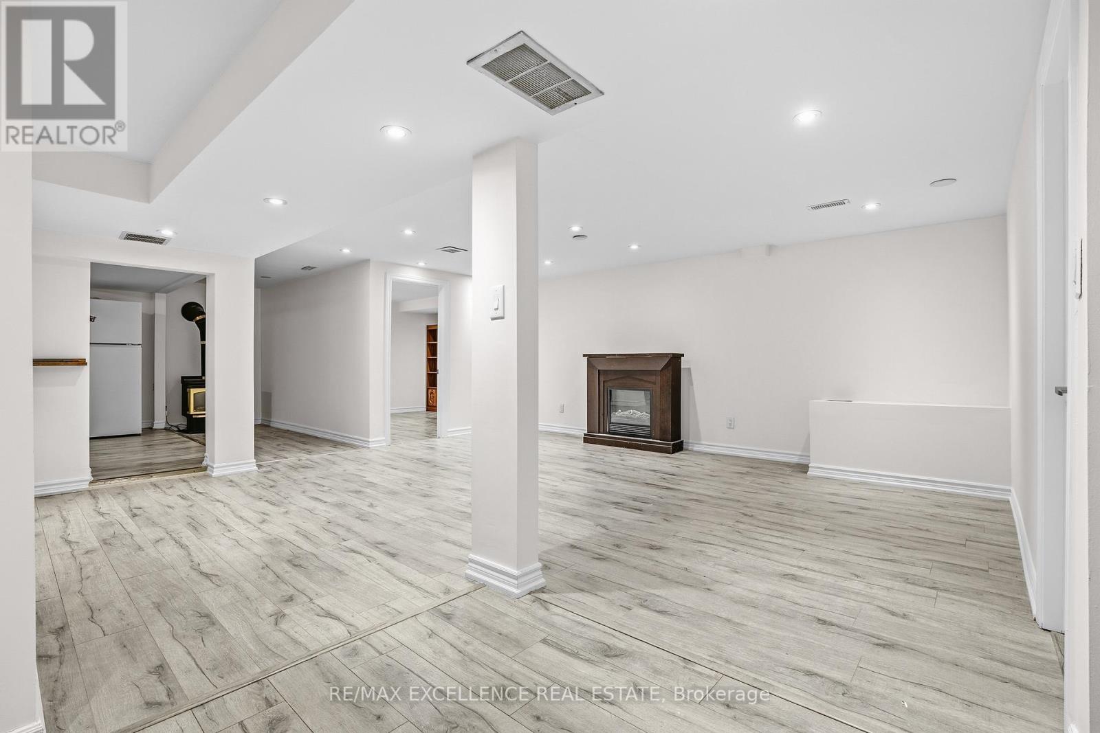 45 Stevenson Road N, Oshawa, ON - Indoor Photo Showing Other Room With Fireplace