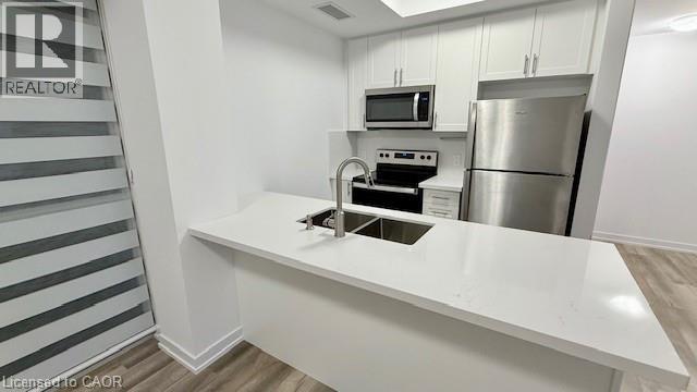 470 Dundas Street E Unit# 1009, Waterdown, ON - Indoor Photo Showing Kitchen With Stainless Steel Kitchen With Upgraded Kitchen