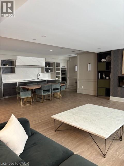 470 Dundas Street E Unit# 1009, Waterdown, ON - Indoor Photo Showing Living Room With Fireplace