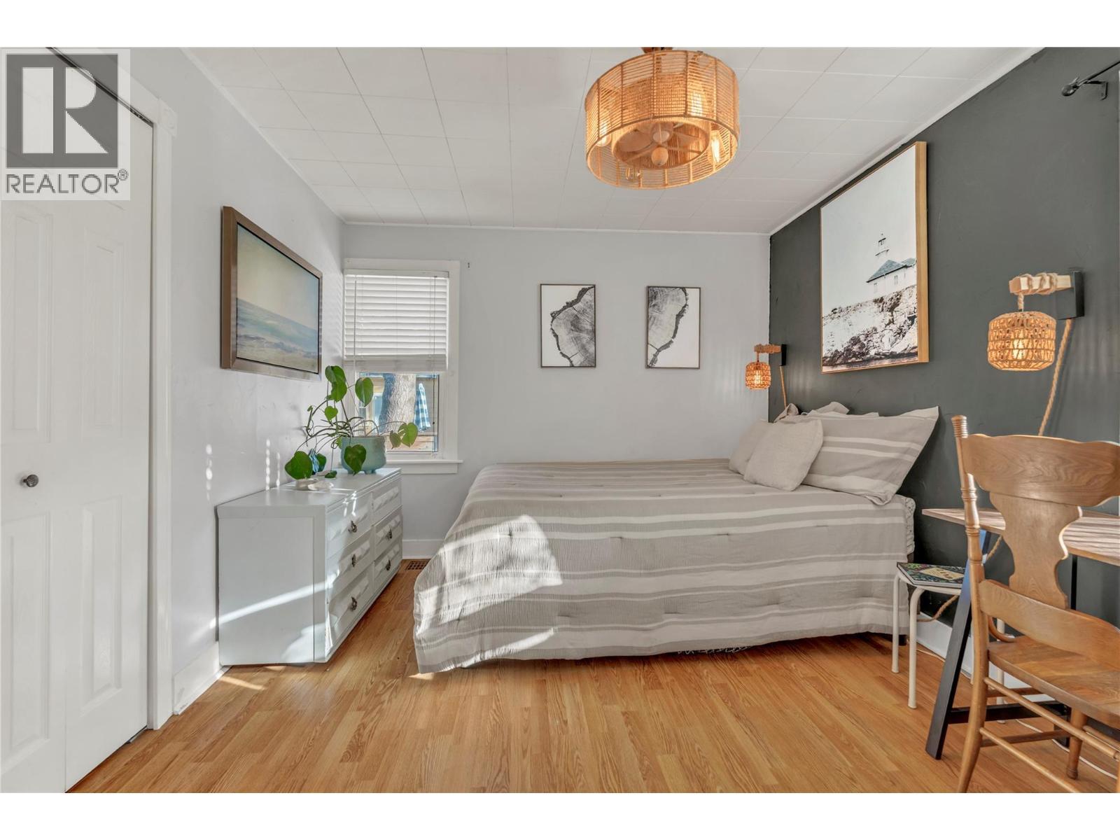 Primary Bedroom - 10120 Julia Street, Summerland, BC - Indoor Photo Showing Bedroom