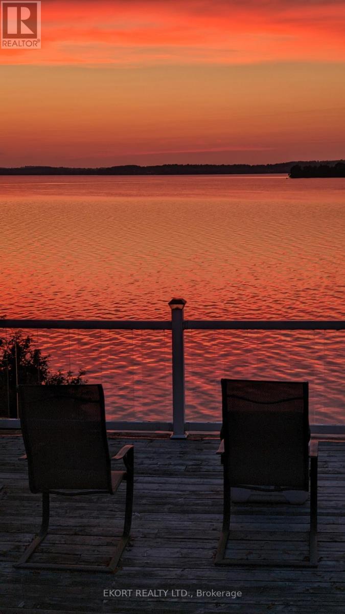 Dusk Water Views - 460 - 5427 Young Street, Hamilton Township, ON - Outdoor With Body Of Water With View