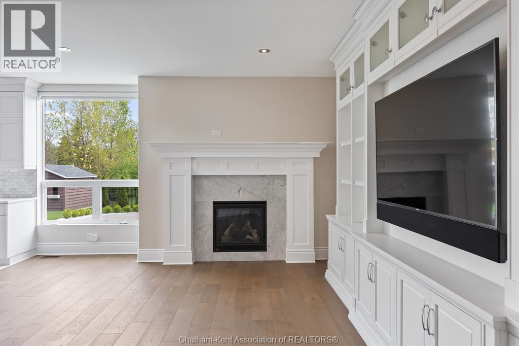 3564 Seven Lakes Drive, Lasalle, ON - Indoor Photo Showing Living Room With Fireplace
