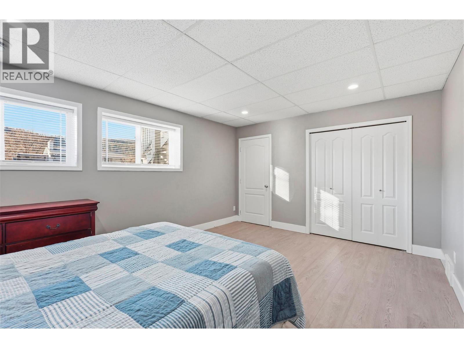 Lower Level-In Law Suite Primary Bedroom - 4654 Spurraway Road, Kamloops, BC - Indoor Photo Showing Bedroom