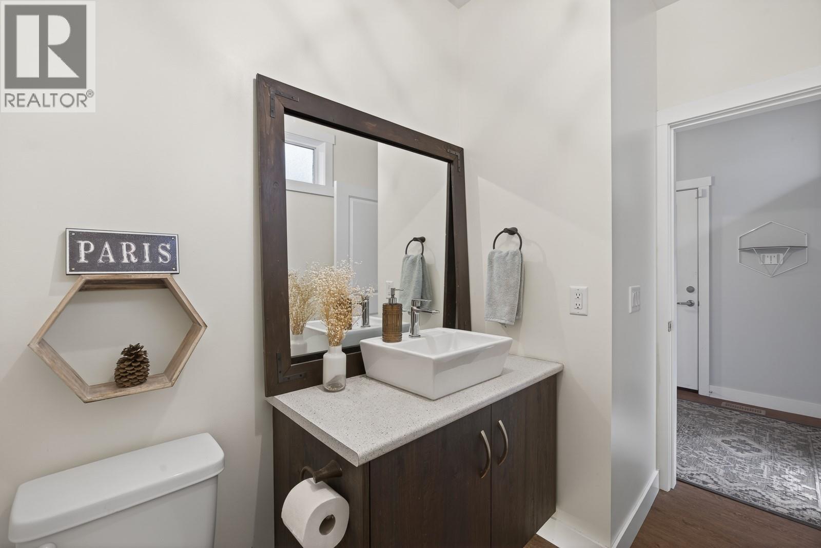 Powder Room on the Main Level - 2893 Robinson Road Unit# 5, Lake Country, BC - Indoor Photo Showing Other Room