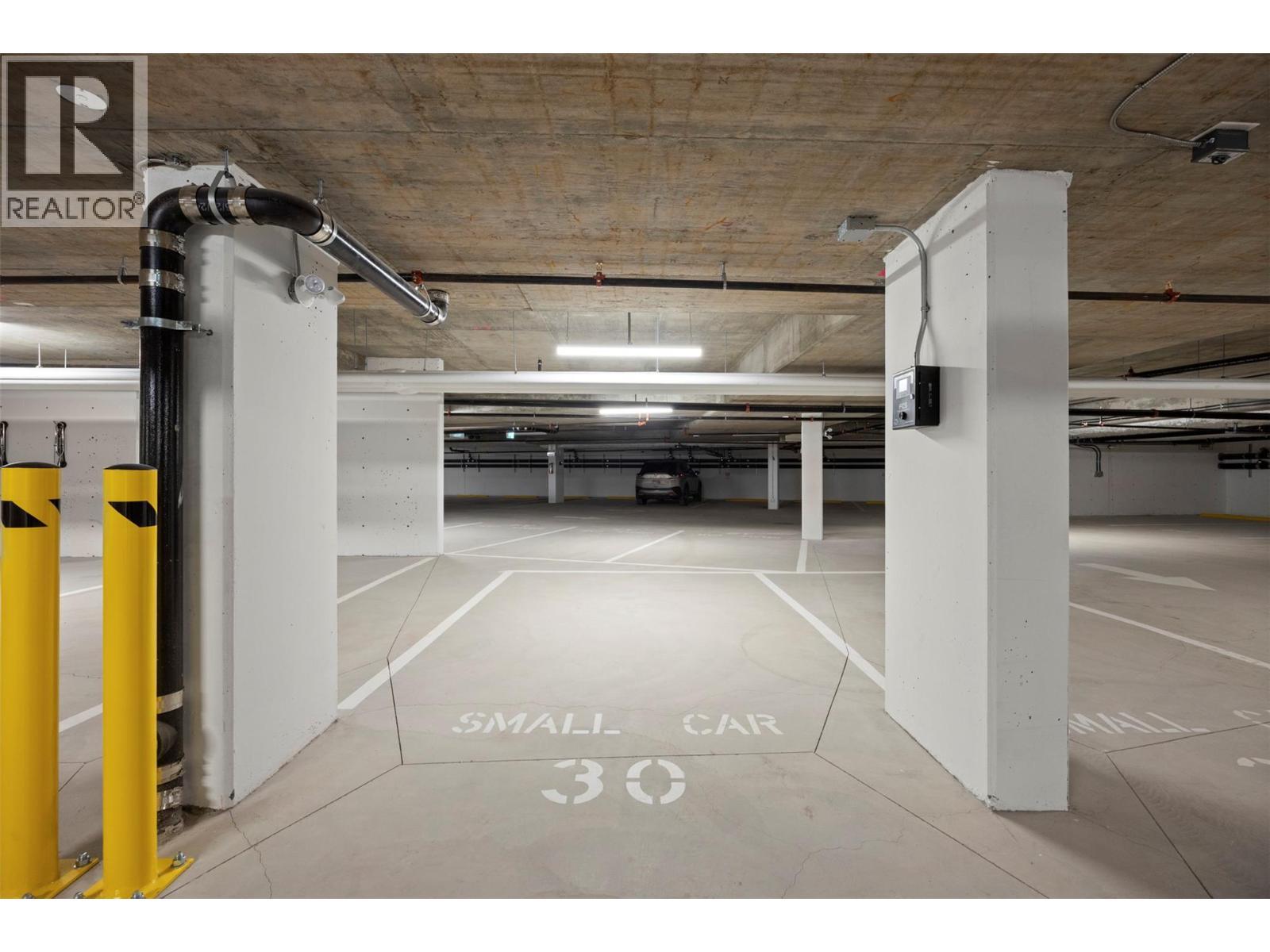 1380 Pridham Avenue Unit# 212, Kelowna, BC - Indoor Photo Showing Garage