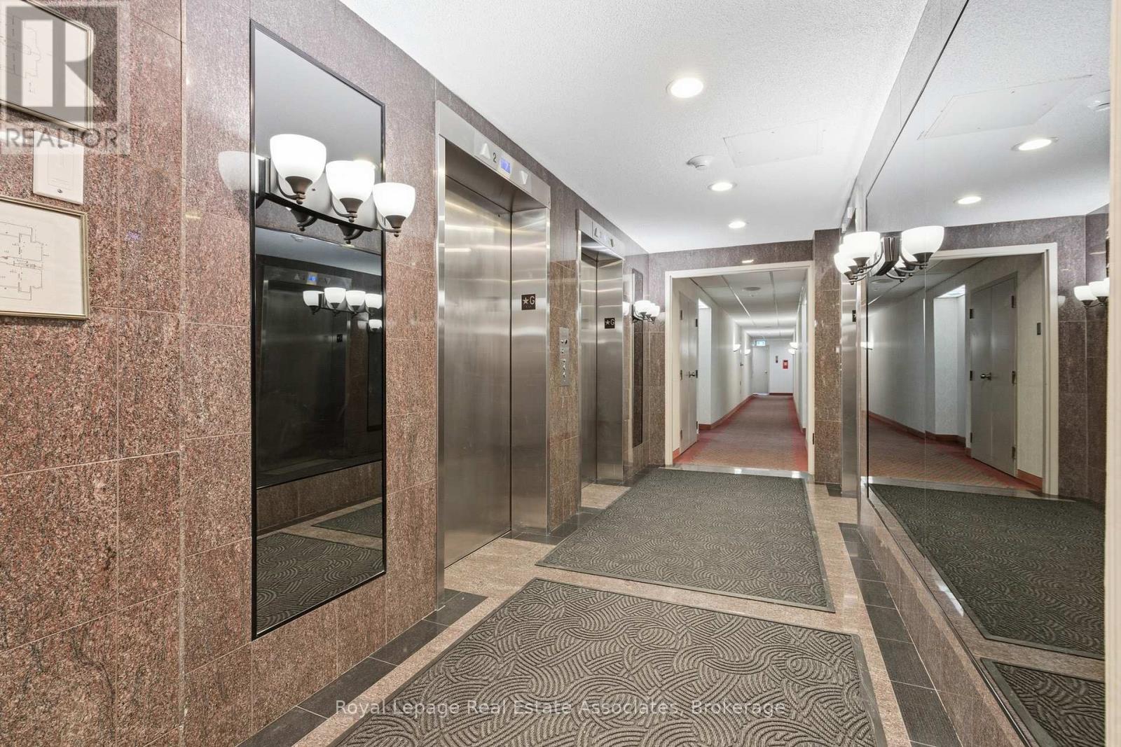 Main Floor Elevators - 1004 - 10 Malta Avenue, Brampton, ON - Indoor Photo Showing Other Room