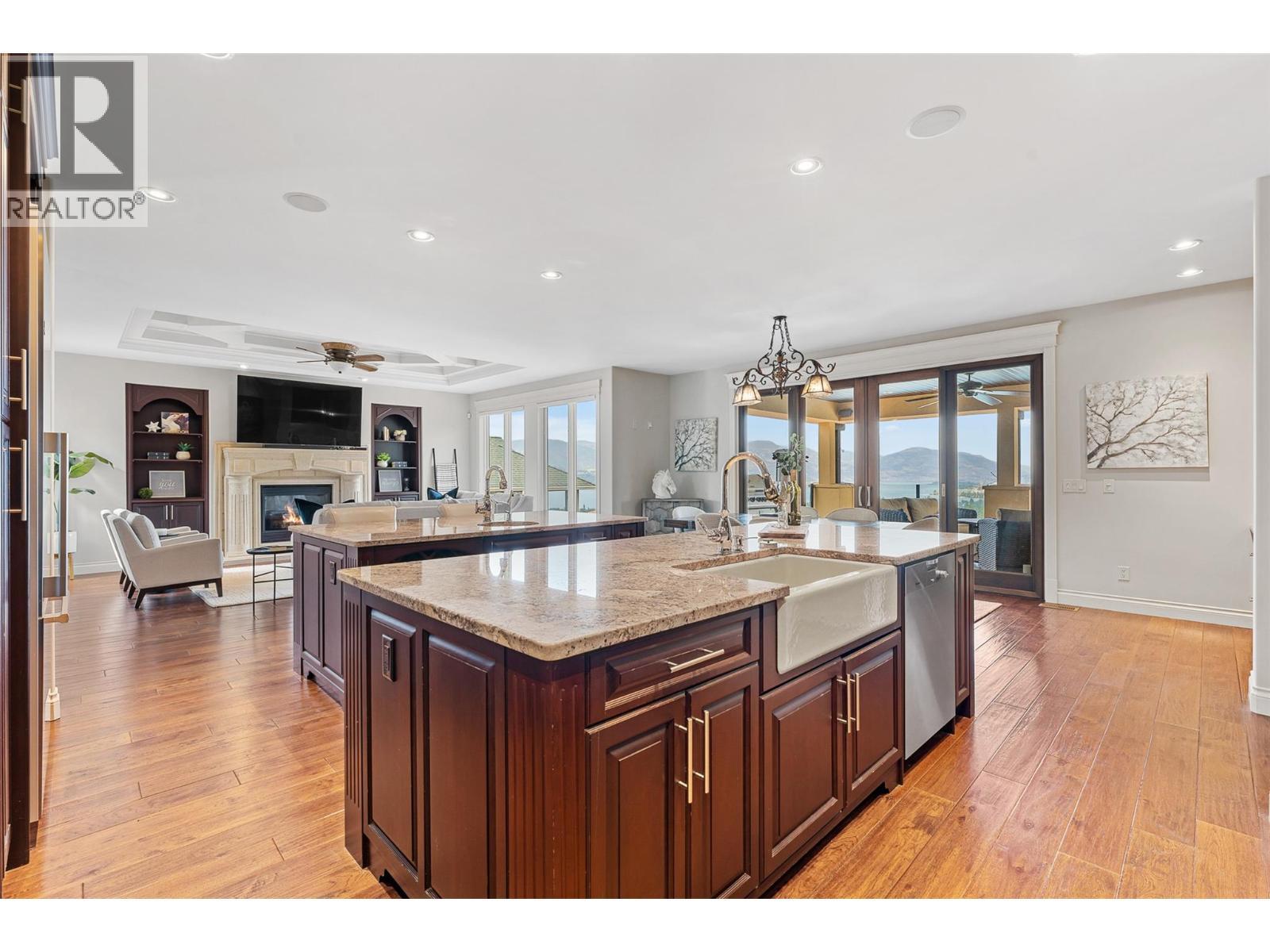 660 Almandine Court, Kelowna, BC - Indoor Photo Showing Other Room With Fireplace