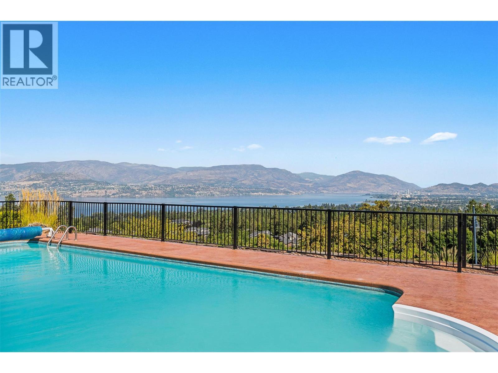 660 Almandine Court, Kelowna, BC - Outdoor With In Ground Pool With View