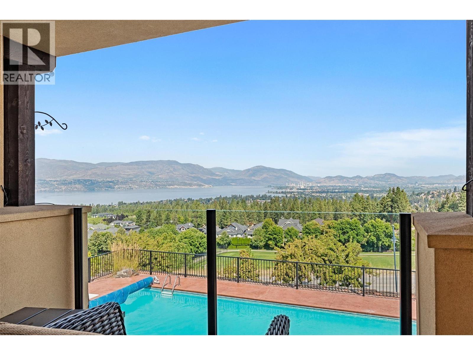 660 Almandine Court, Kelowna, BC - Outdoor With In Ground Pool With View