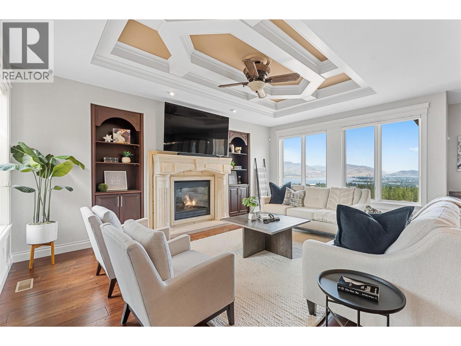 660 Almandine Court, Kelowna, BC - Indoor Photo Showing Living Room With Fireplace