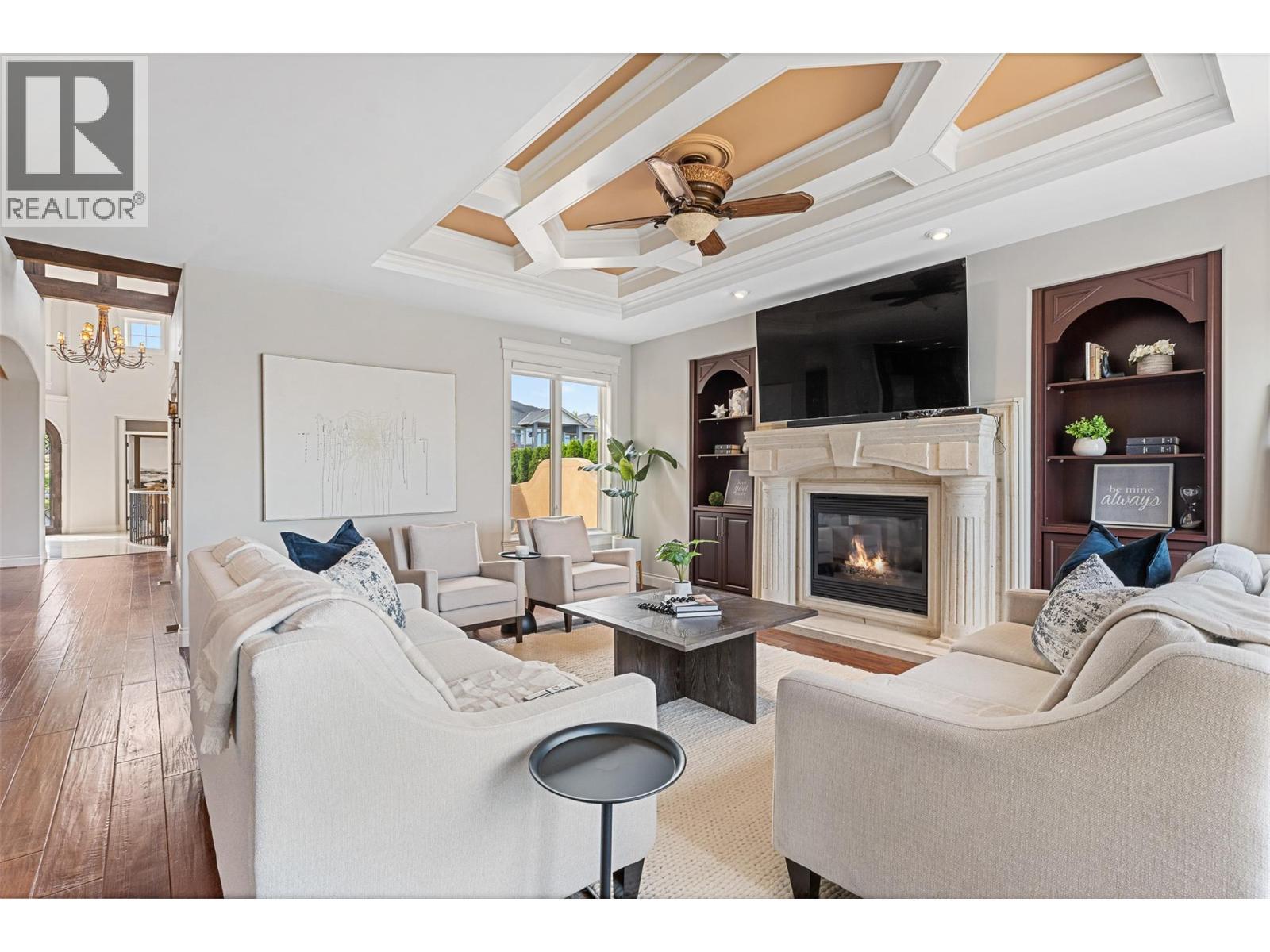 660 Almandine Court, Kelowna, BC - Indoor Photo Showing Living Room With Fireplace