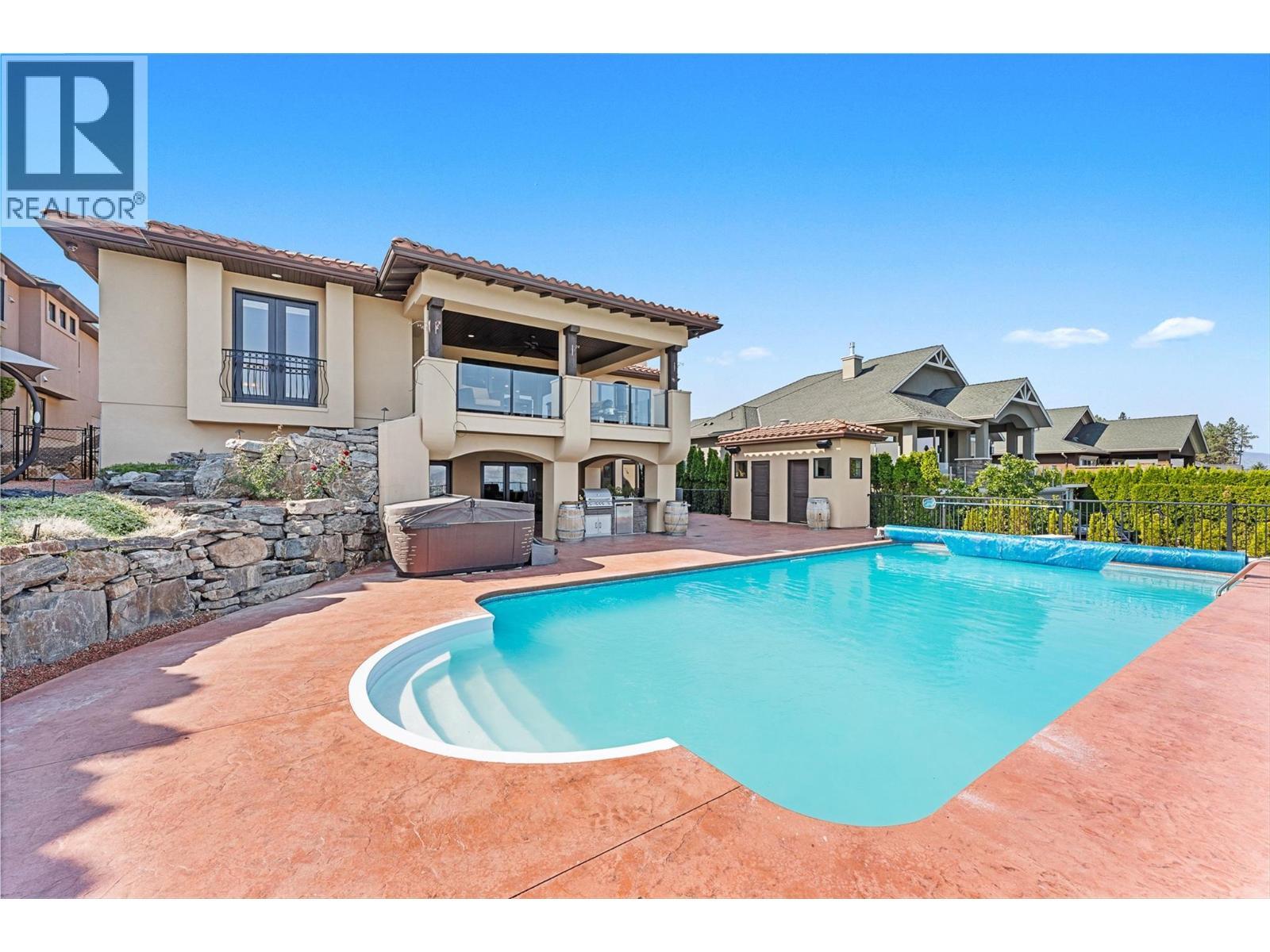 660 Almandine Court, Kelowna, BC - Outdoor With In Ground Pool With Backyard