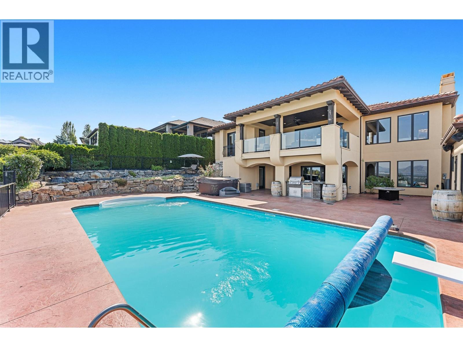 660 Almandine Court, Kelowna, BC - Outdoor With In Ground Pool With Balcony With Backyard