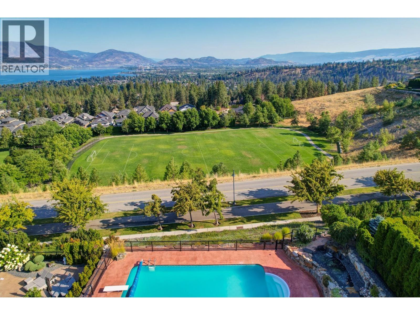 660 Almandine Court, Kelowna, BC - Outdoor With In Ground Pool With View
