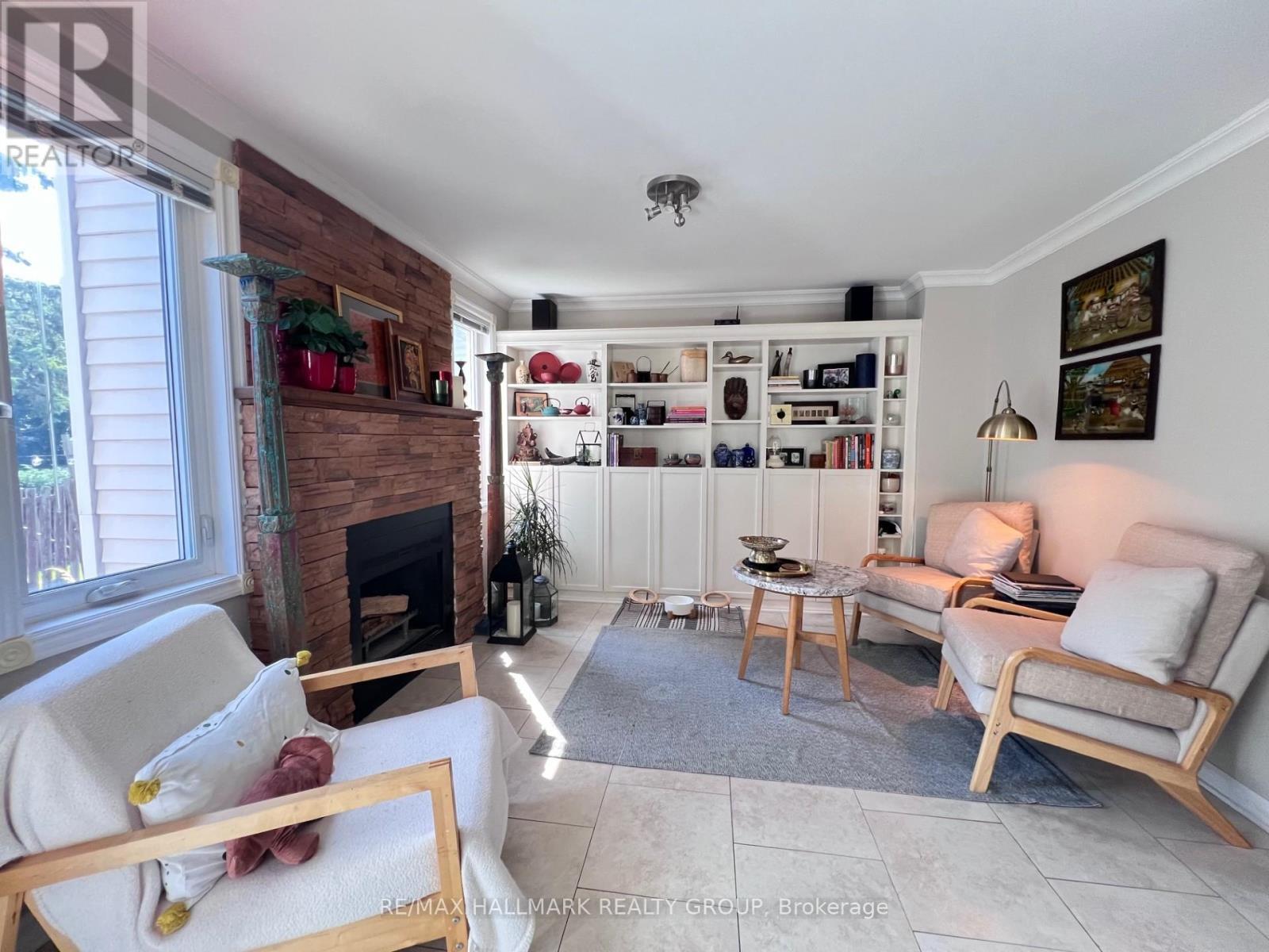 4 Cadence Gate, Ottawa, ON - Indoor Photo Showing Other Room With Fireplace