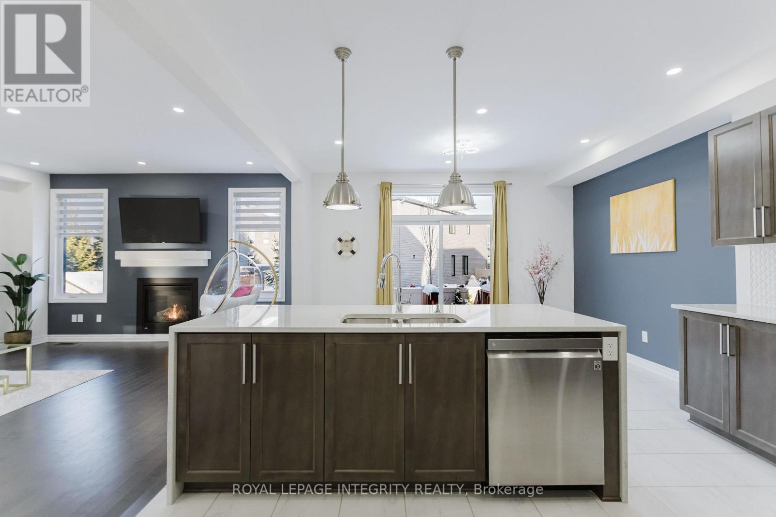 719 Samantha Eastop Avenue, Ottawa, ON - Indoor Photo Showing Kitchen With Fireplace With Double Sink