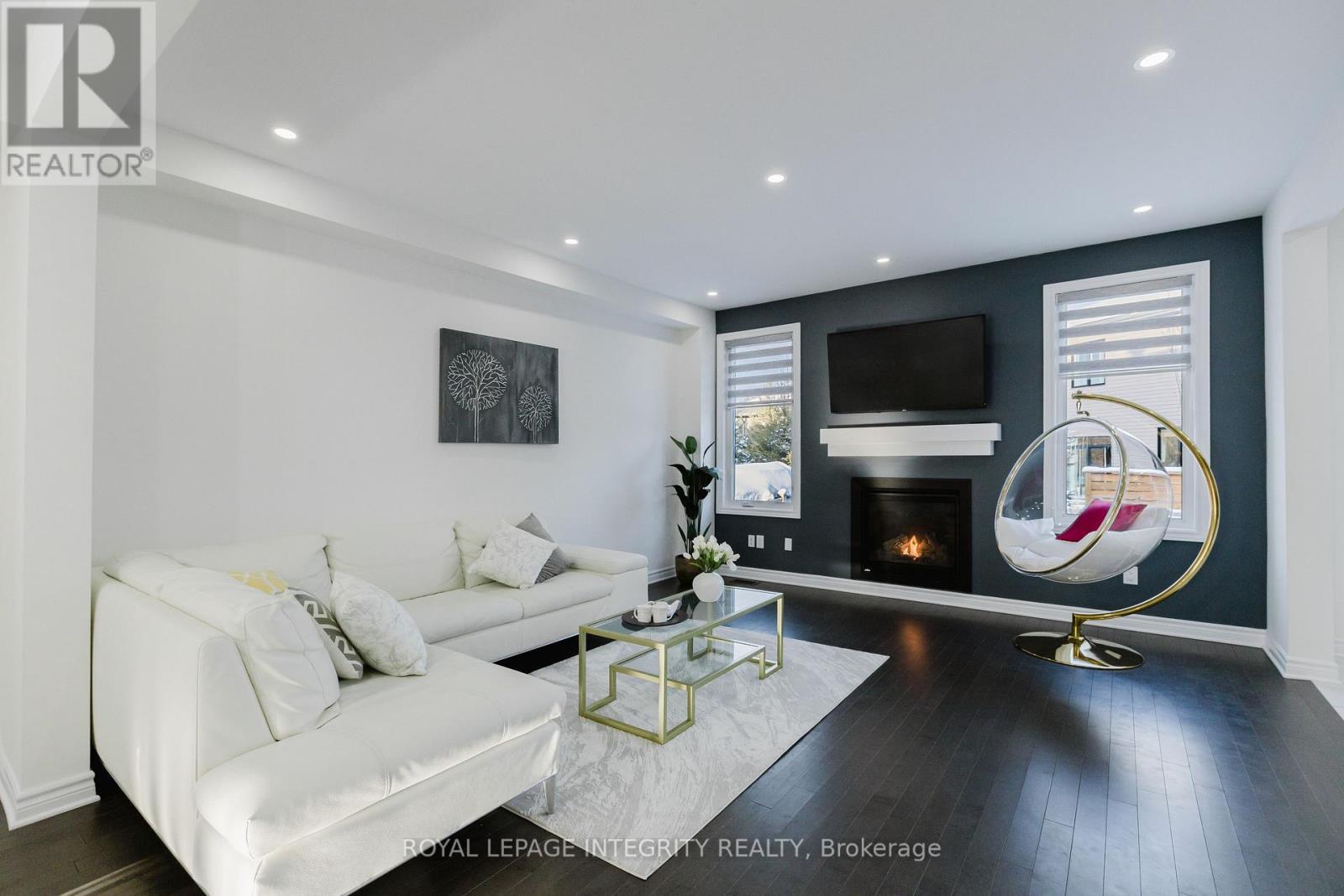 719 Samantha Eastop Avenue, Ottawa, ON - Indoor Photo Showing Living Room With Fireplace
