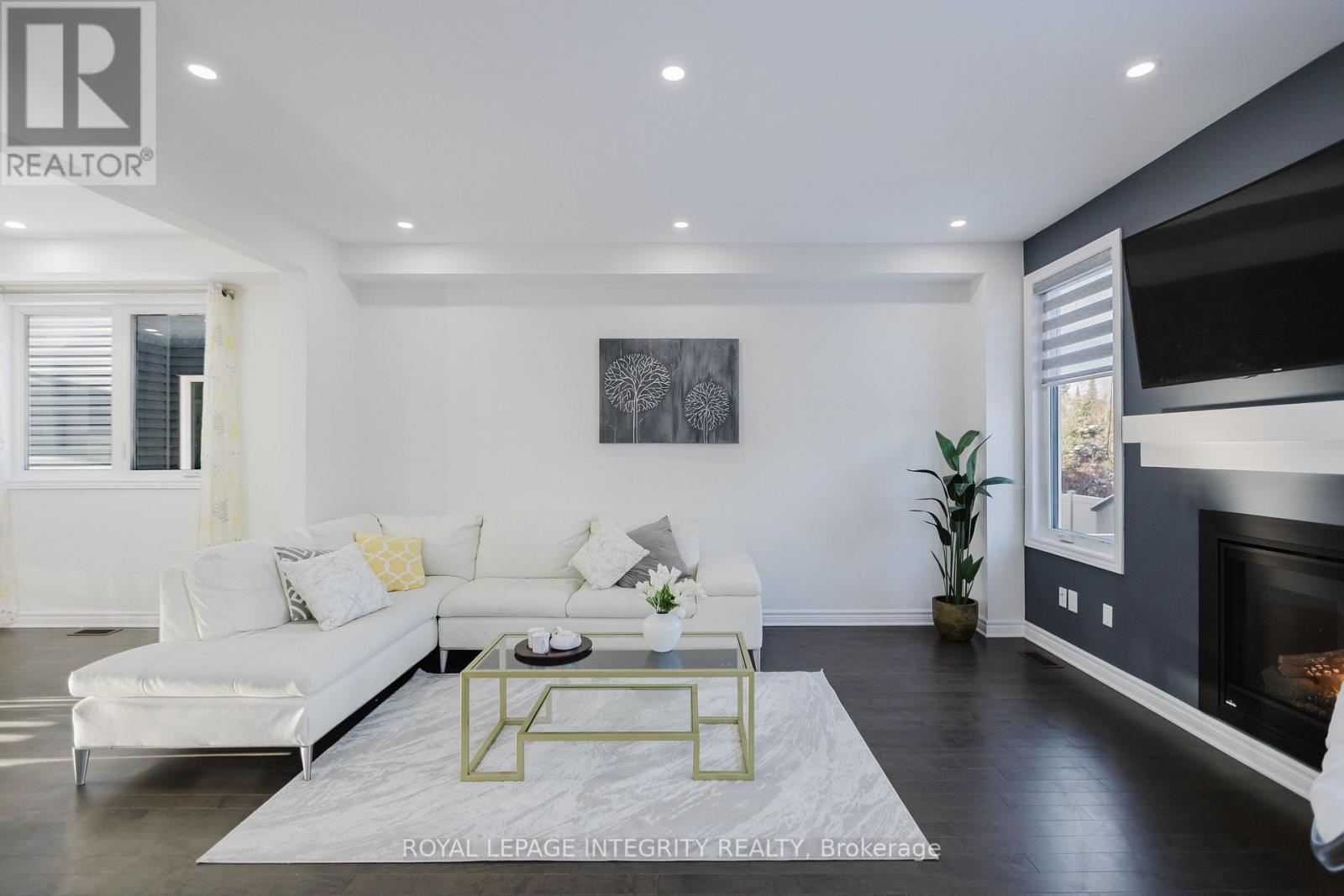 719 Samantha Eastop Avenue, Ottawa, ON - Indoor Photo Showing Living Room With Fireplace