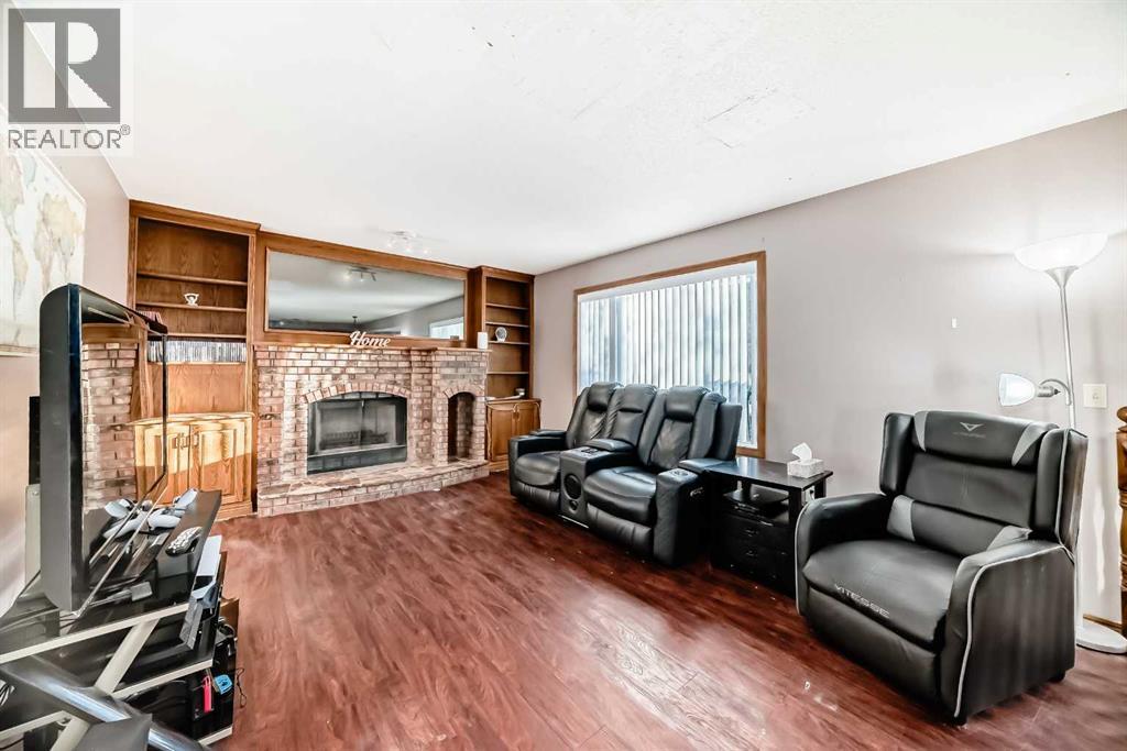 78 Sandringham Way Nw, Calgary, AB - Indoor Photo Showing Living Room With Fireplace
