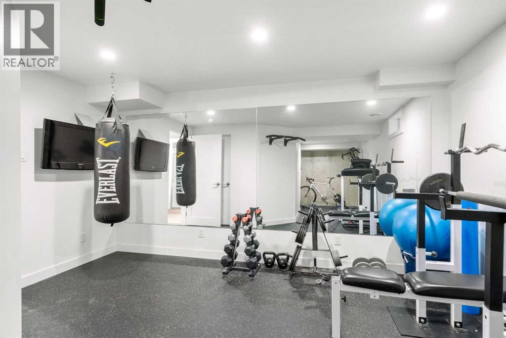 3332 Caribou Drive Nw, Calgary, AB - Indoor Photo Showing Gym Room