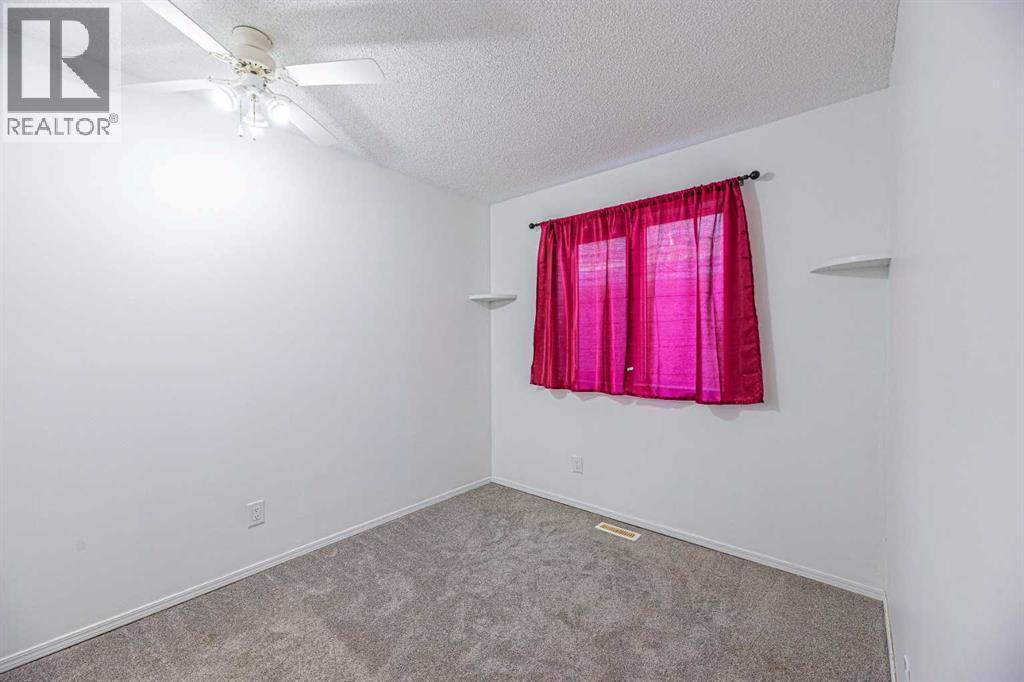 38 Martindale Drive Ne, Calgary, AB - Indoor Photo Showing Other Room