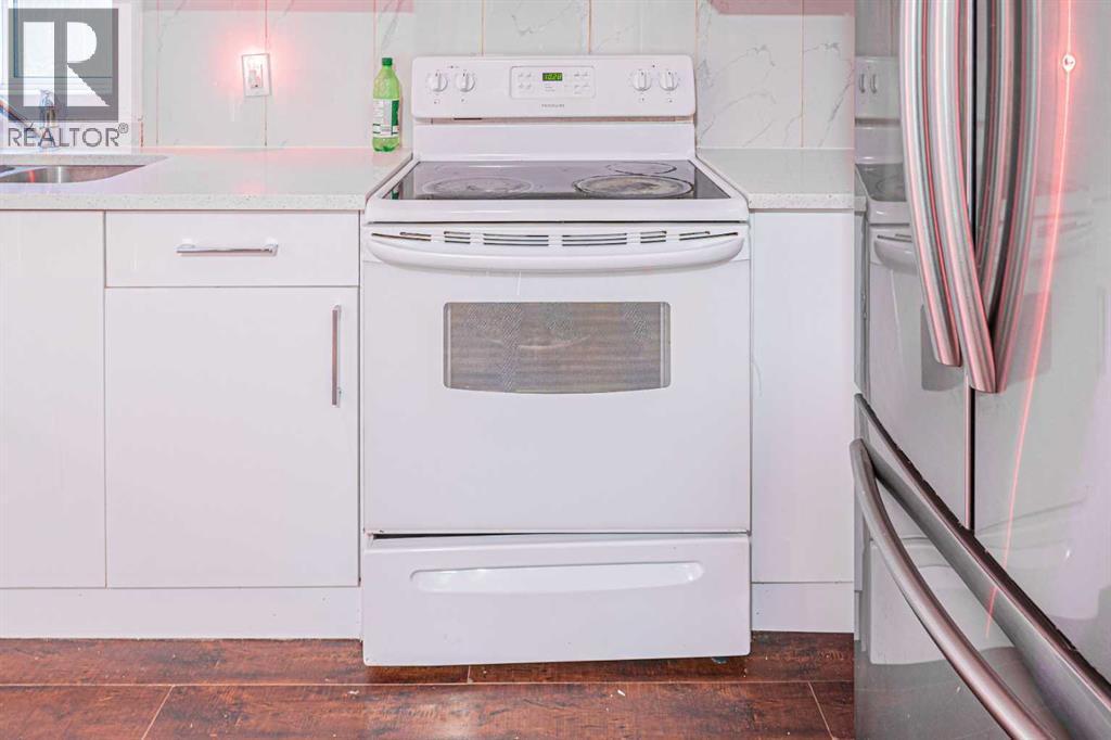 38 Martindale Drive Ne, Calgary, AB - Indoor Photo Showing Laundry Room