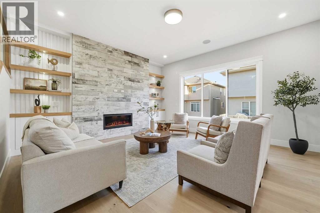 425 Watercrest Place, Chestermere, AB - Indoor Photo Showing Living Room With Fireplace