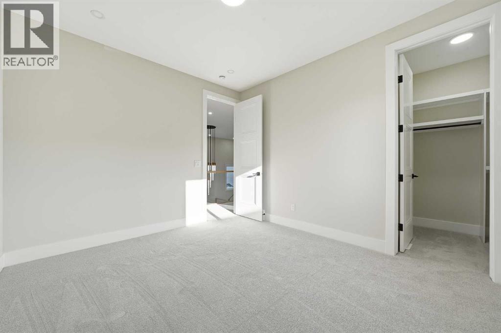 425 Watercrest Place, Chestermere, AB - Indoor Photo Showing Other Room