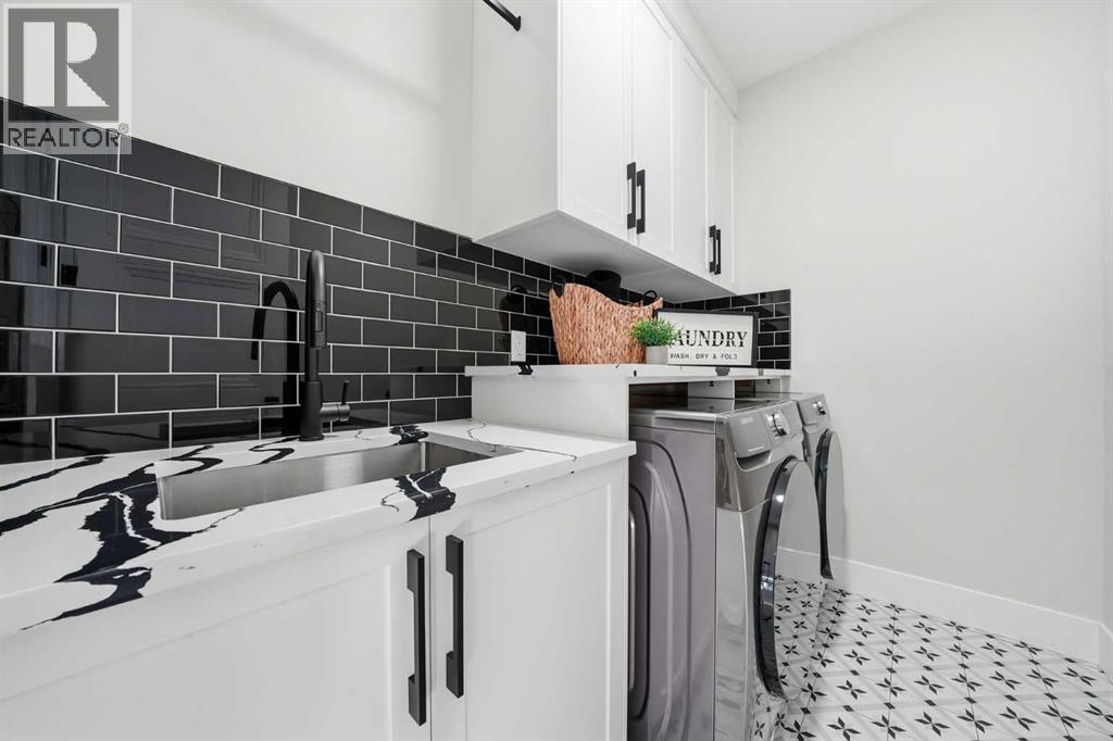 425 Watercrest Place, Chestermere, AB - Indoor Photo Showing Laundry Room