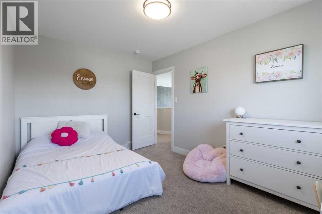 4889 7Th Street W, Claresholm, AB - Indoor Photo Showing Bedroom