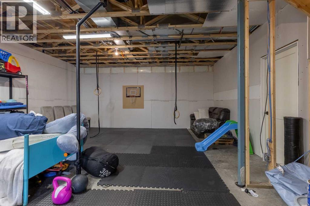 4889 7Th Street W, Claresholm, AB - Indoor Photo Showing Basement