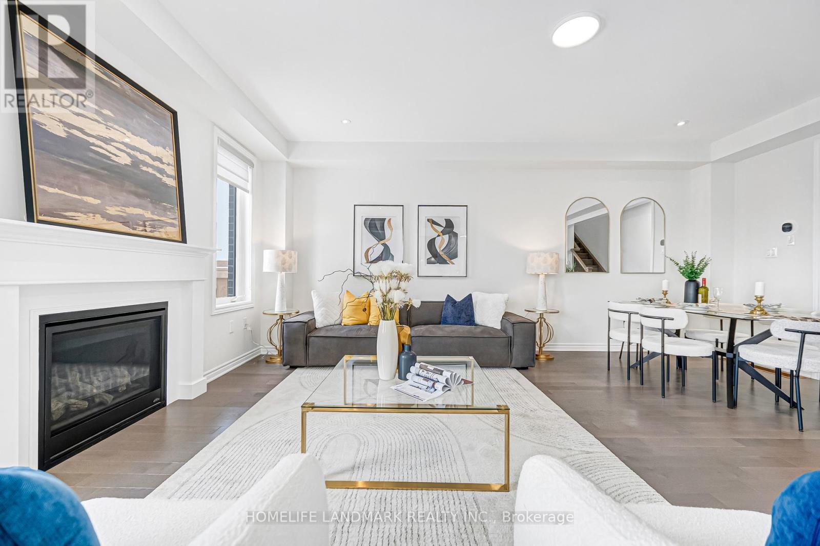 89 Barkerville Drive, Whitby, ON - Indoor Photo Showing Living Room With Fireplace