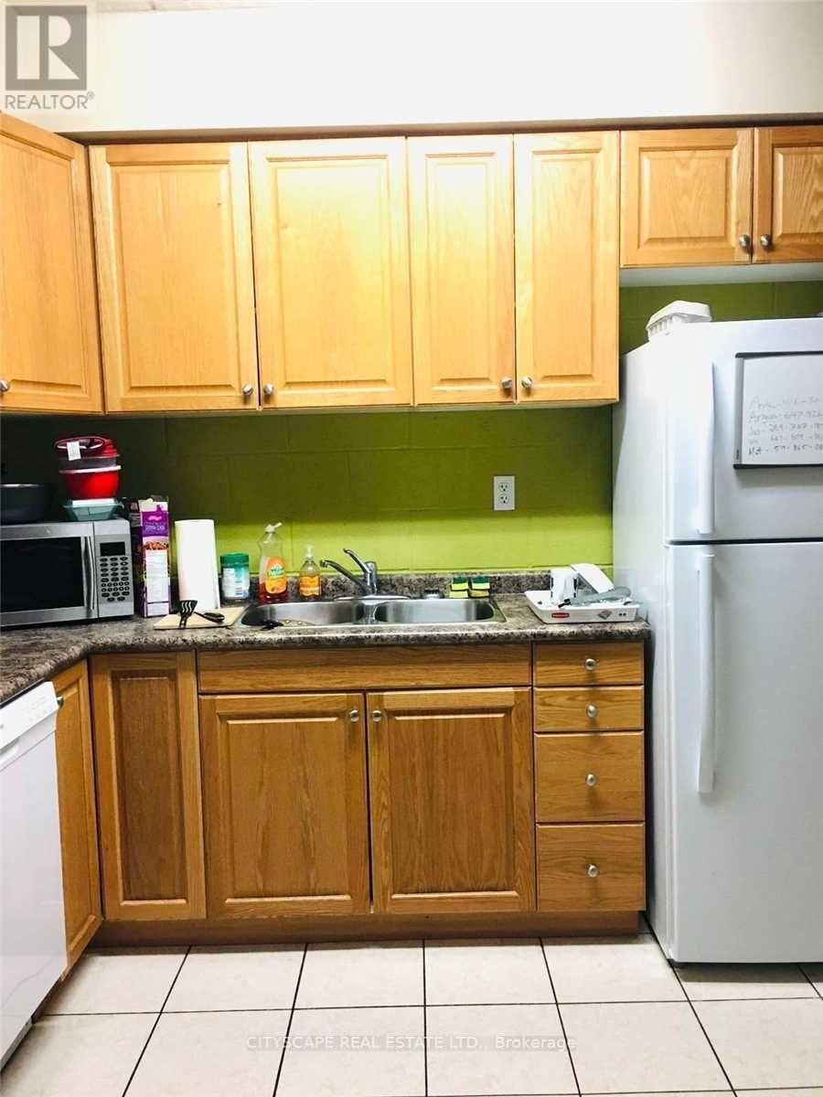 #104 - 253 Lester Street, Waterloo, ON - Indoor Photo Showing Kitchen With Double Sink