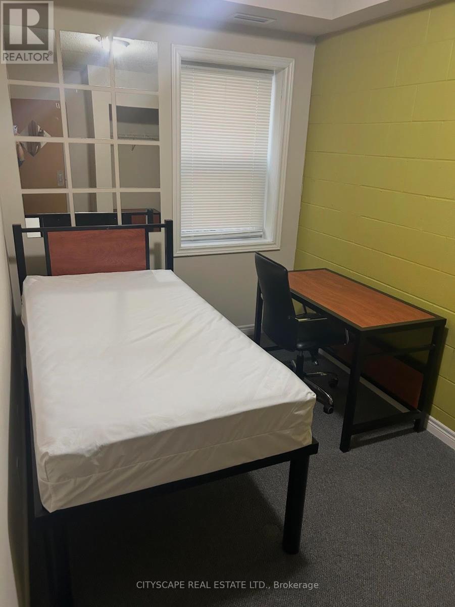 Bedroom 1 - #104 - 253 Lester Street, Waterloo, ON - Indoor Photo Showing Other Room