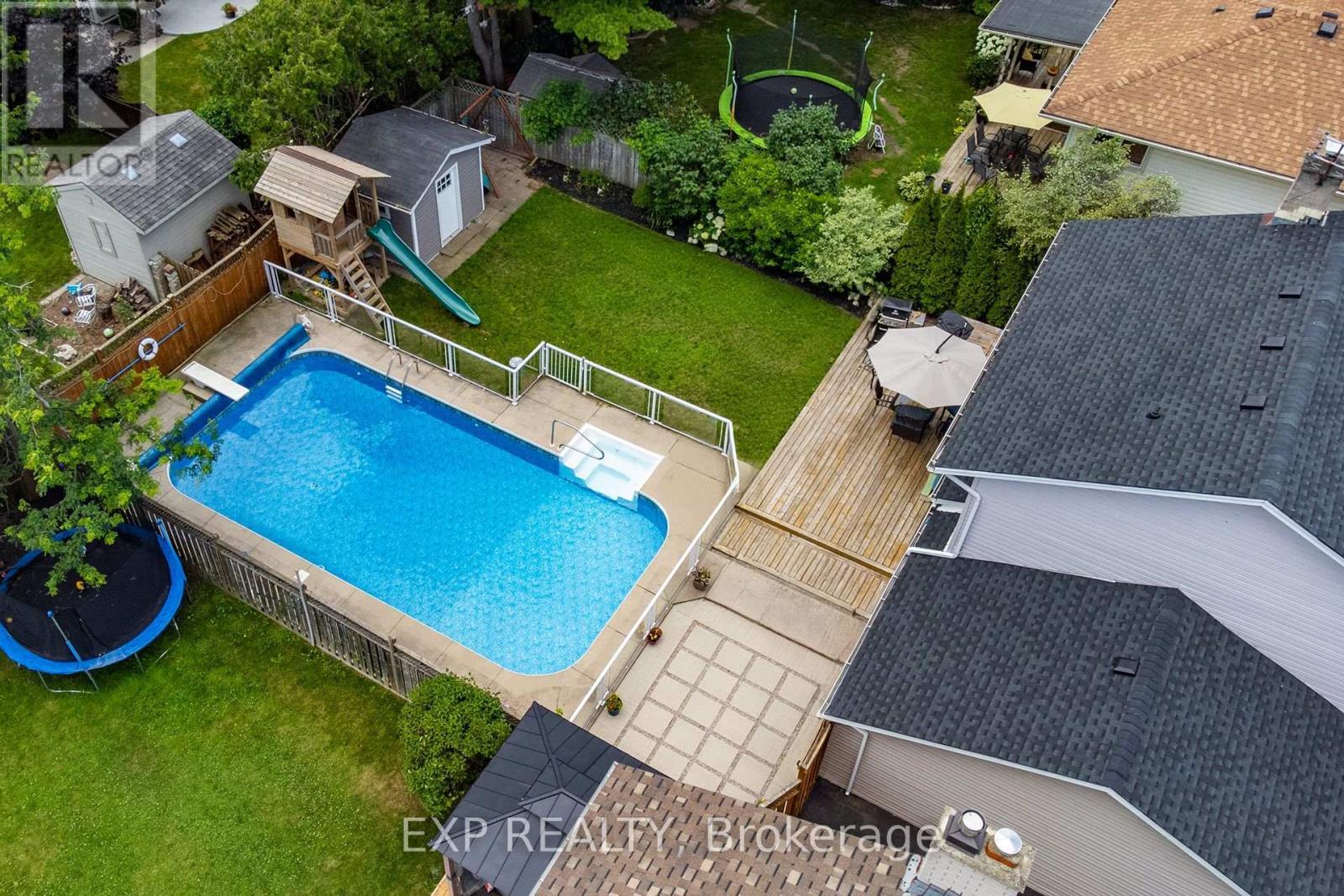 23 Dooley Drive, Kitchener, ON - Outdoor With In Ground Pool With Deck Patio Veranda