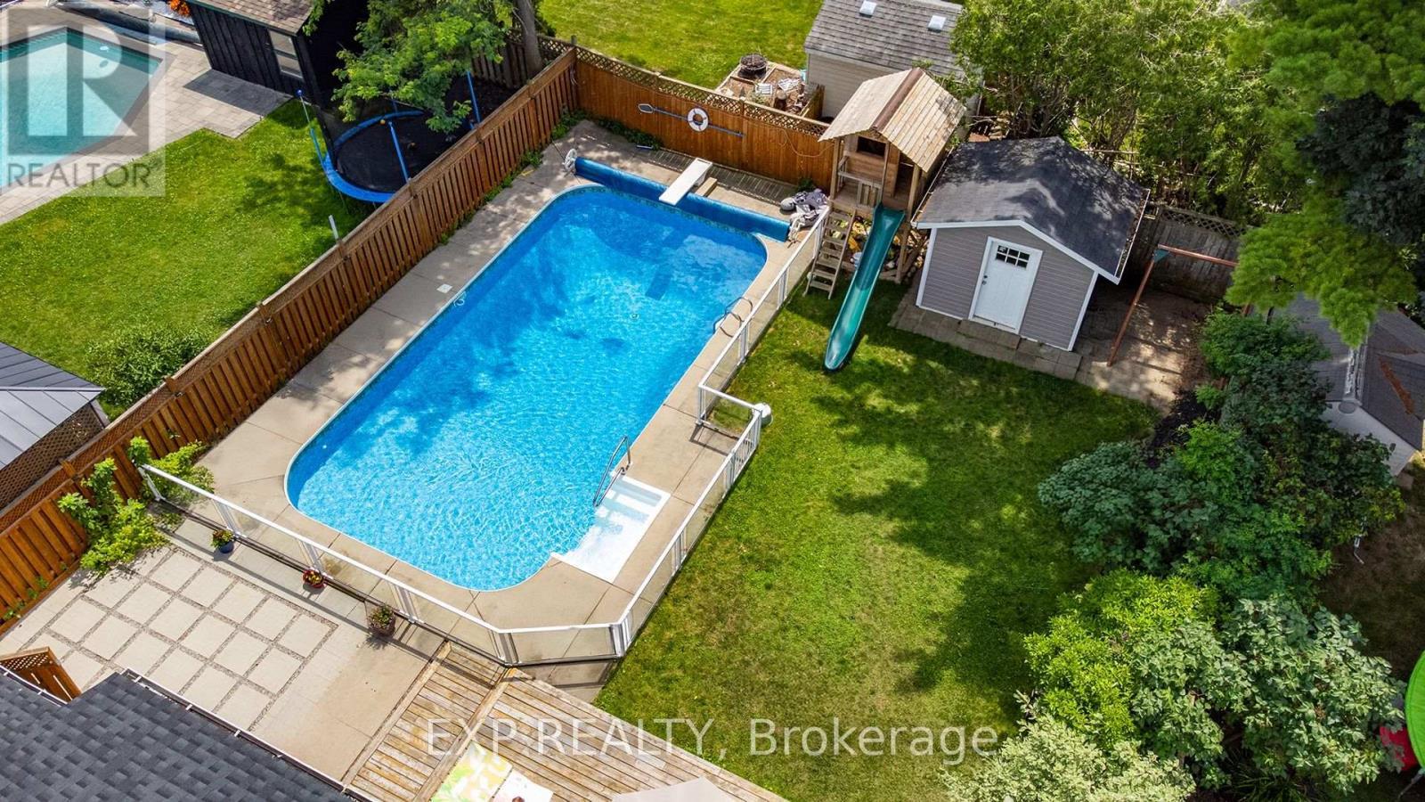 23 Dooley Drive, Kitchener, ON - Outdoor With In Ground Pool With Deck Patio Veranda