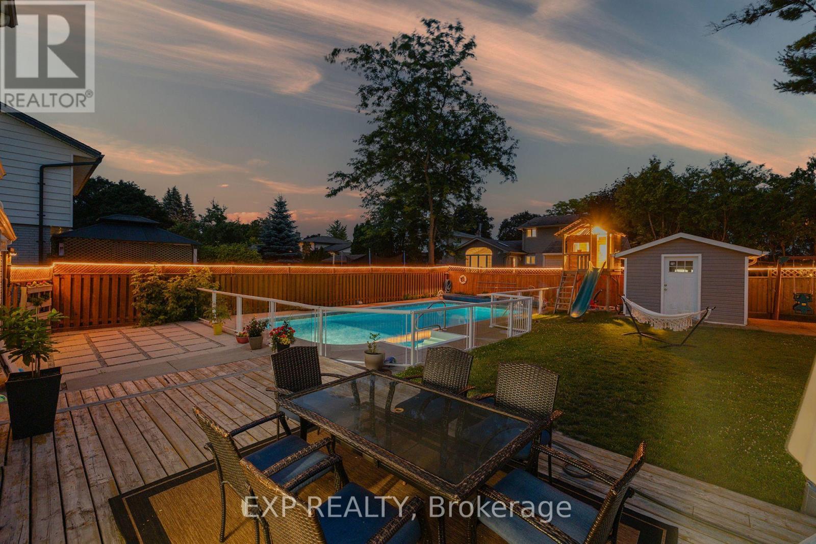 23 Dooley Drive, Kitchener, ON - Outdoor With In Ground Pool With Deck Patio Veranda