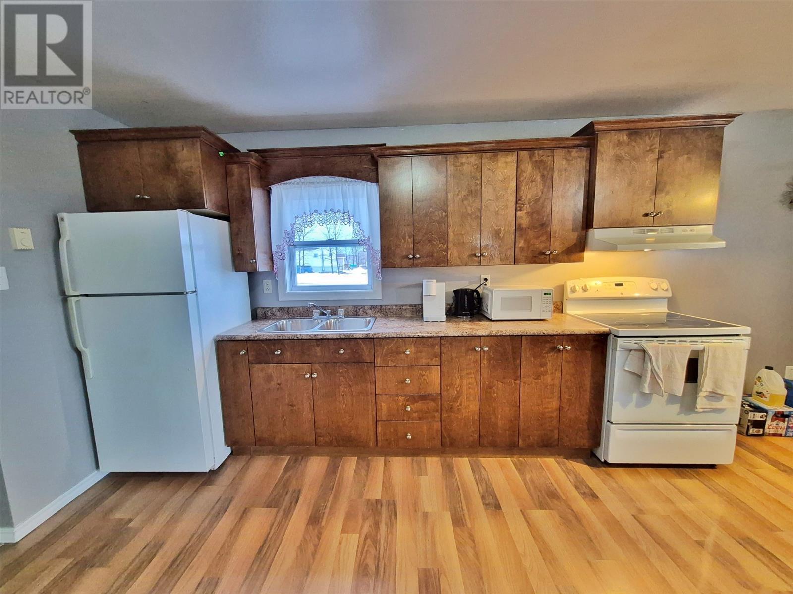 211A Main Street, Peterview, NL - Indoor Photo Showing Kitchen With Double Sink