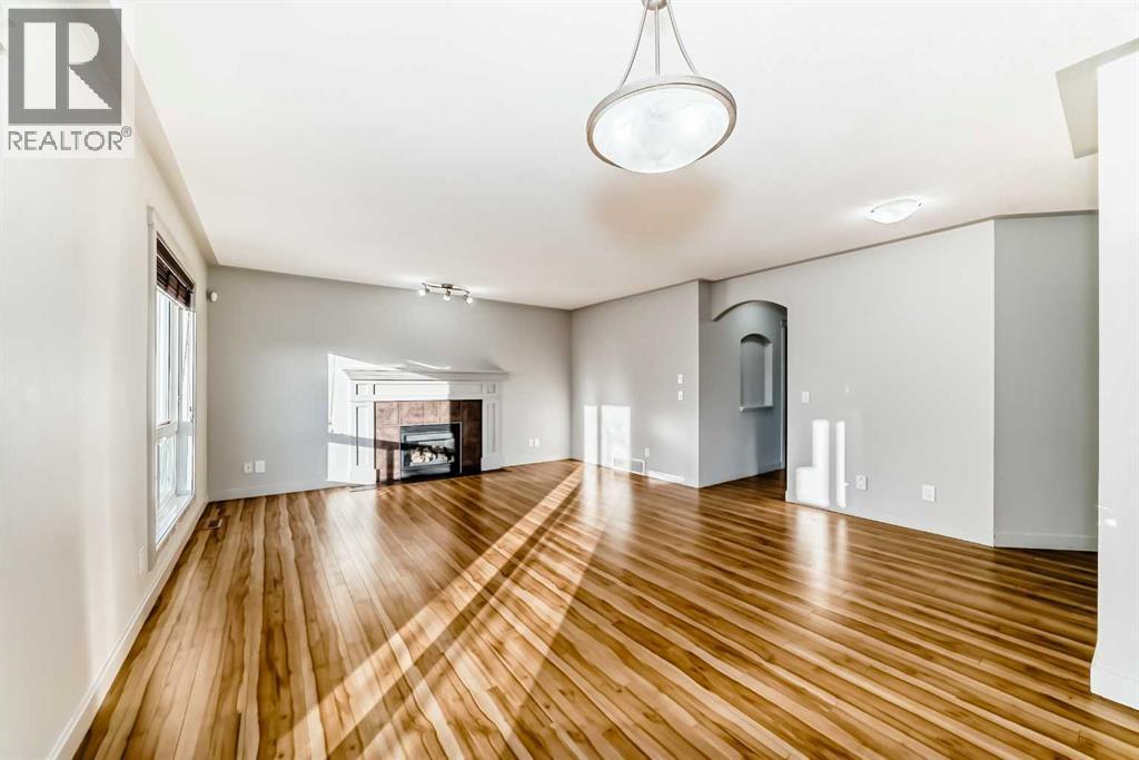 1156 Sherwood Boulevard Nw, Calgary, AB - Indoor With Fireplace