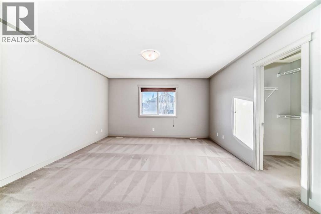 1156 Sherwood Boulevard Nw, Calgary, AB - Indoor Photo Showing Other Room