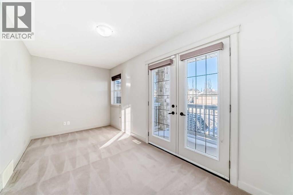 1156 Sherwood Boulevard Nw, Calgary, AB - Indoor Photo Showing Other Room