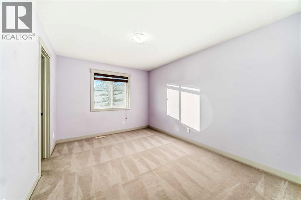 1156 Sherwood Boulevard Nw, Calgary, AB - Indoor Photo Showing Other Room